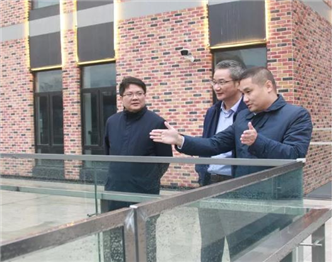 上海市宝山区副区长苏平一行前往公司新业坊办公场地调研